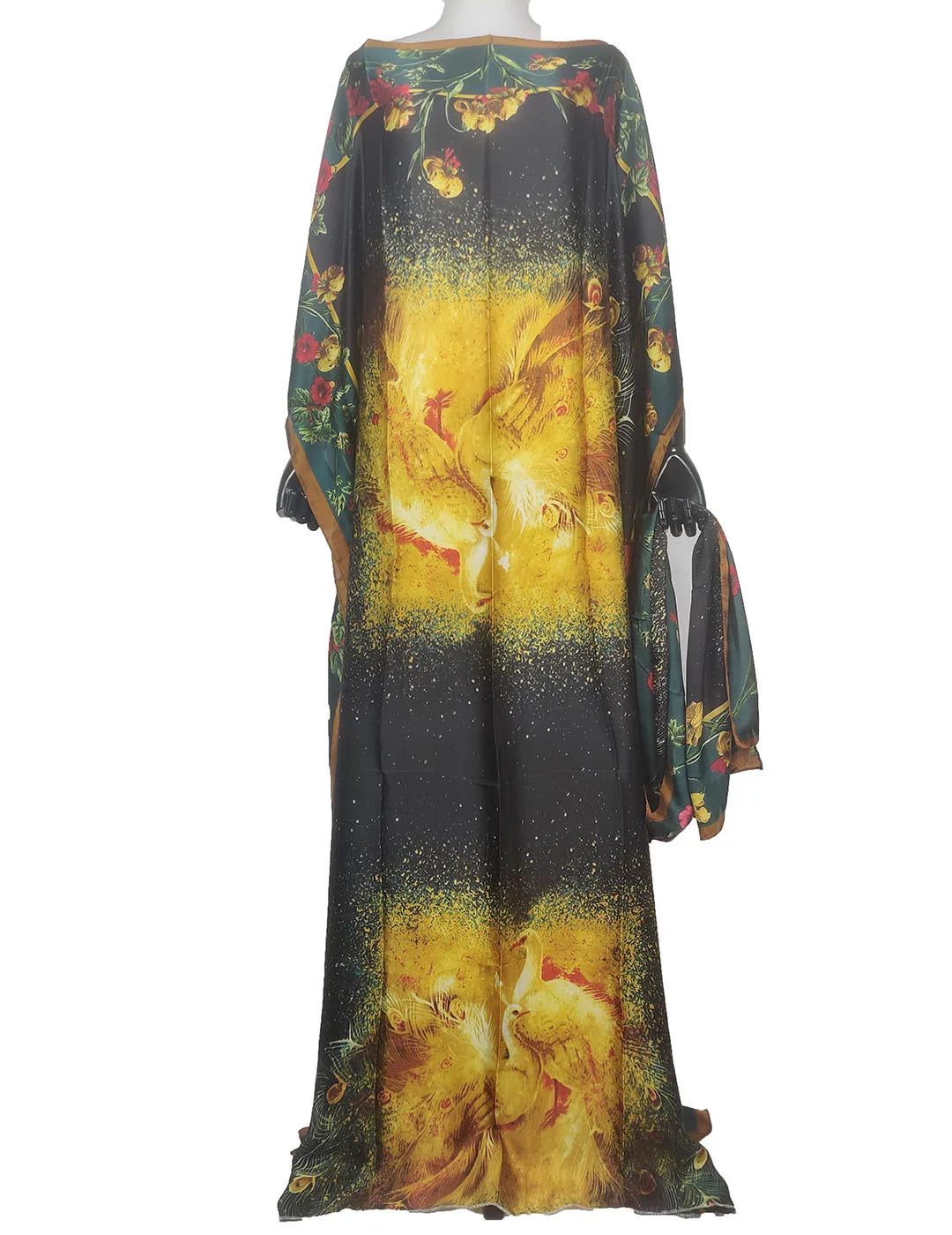 A long, flowing kaftan dress featuring a dark background with vibrant yellow and green floral patterns.