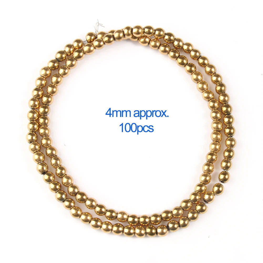 A string of small, round gold-plated hematite beads used for DIY jewelry.