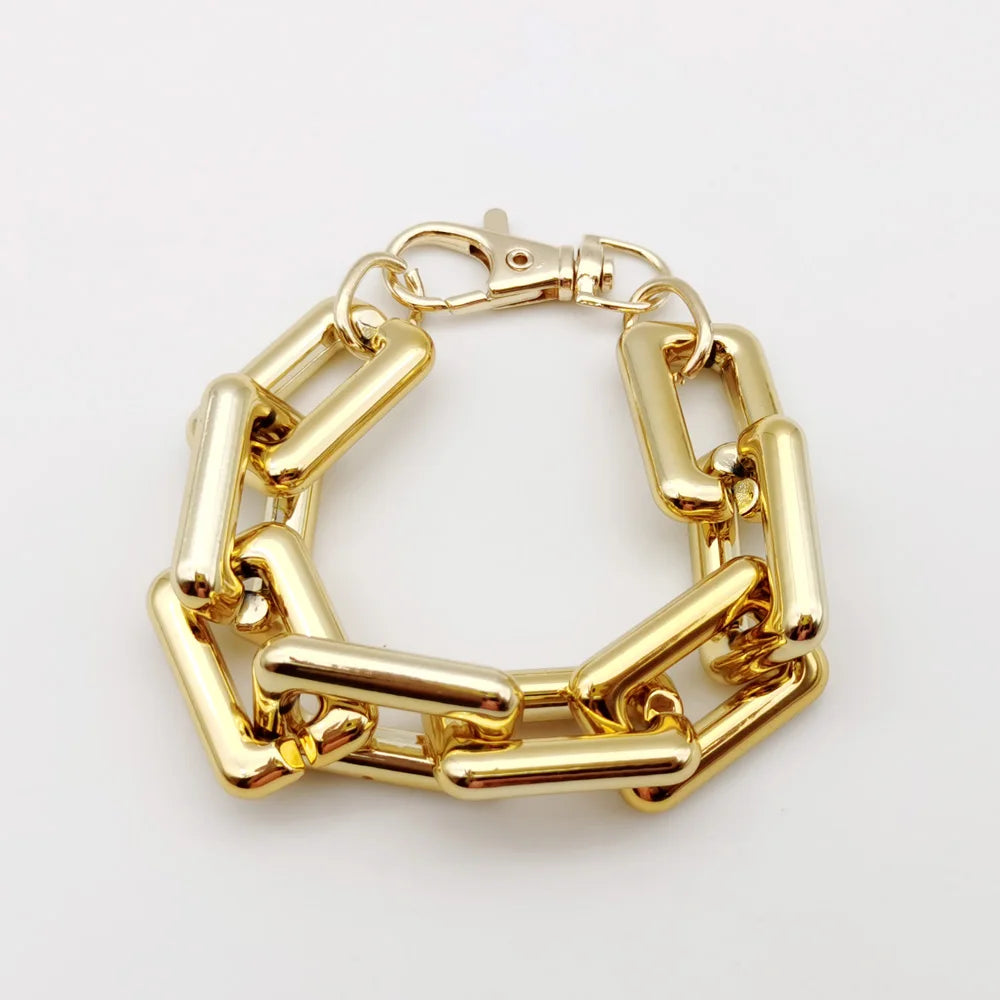 A gold-colored boho punk twisted link necklace with a clasp.