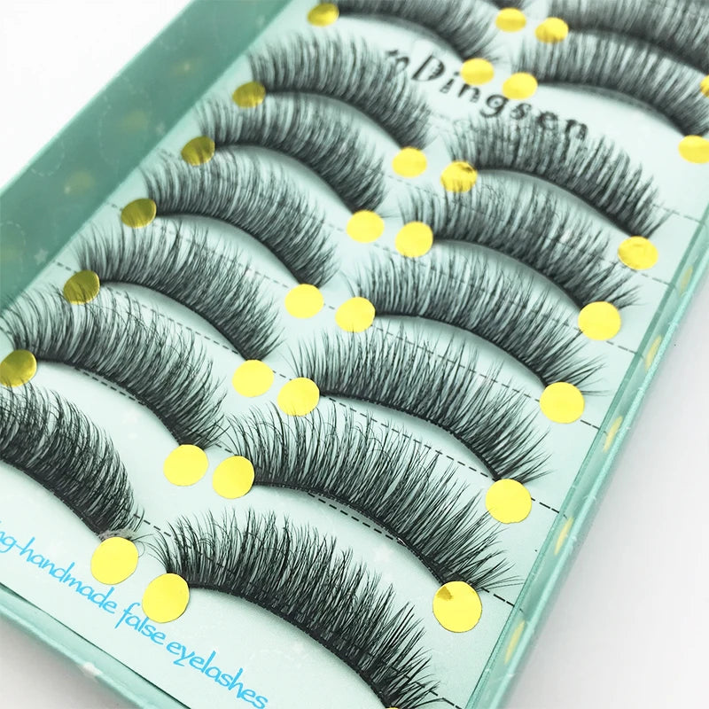 A box of dark gray mink-style false eyelashes with gold accents and the brand name Dingsen.