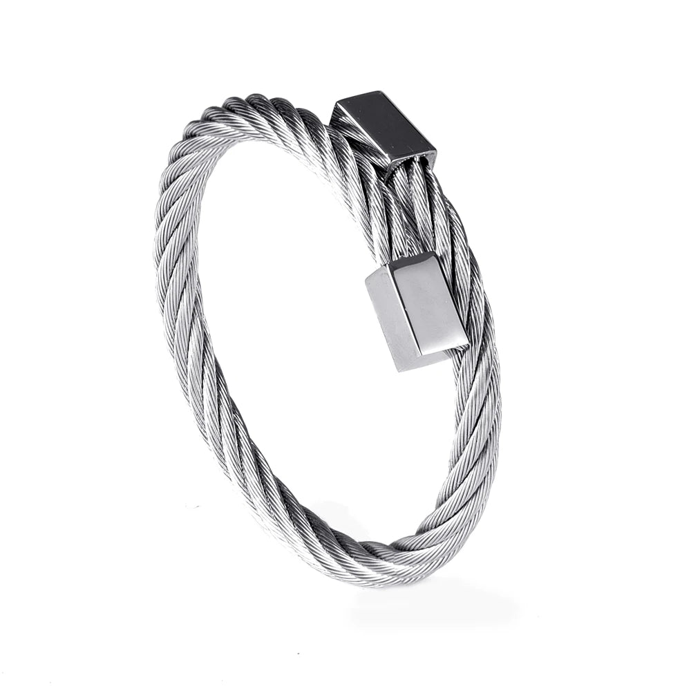 A silver stainless steel bracelet made of twisted wire with a rectangular clasp.