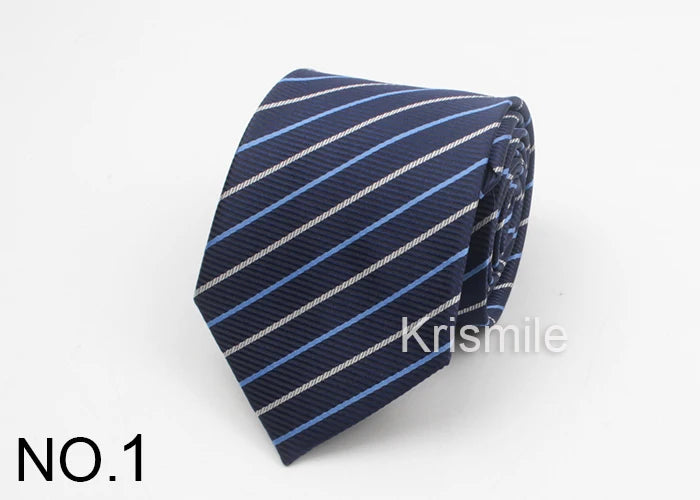A dark blue striped necktie with thin light stripes and a subtle dot pattern folded neatly.
