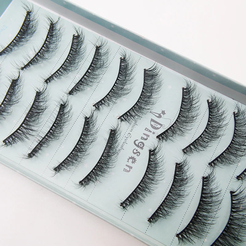 A display of various handmade 3D mink false eyelashes in different styles and lengths.
