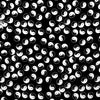 Fondo negro con un patrón repetitivo de símbolos yin-yang blancos.