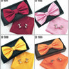 Four sets of elegant men's bow ties and cufflinks in various colors including red, pink, yellow, and orange.