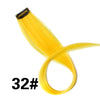 A bundle of bright yellow 32# synthetic hair extensions with a clip-in attachment.