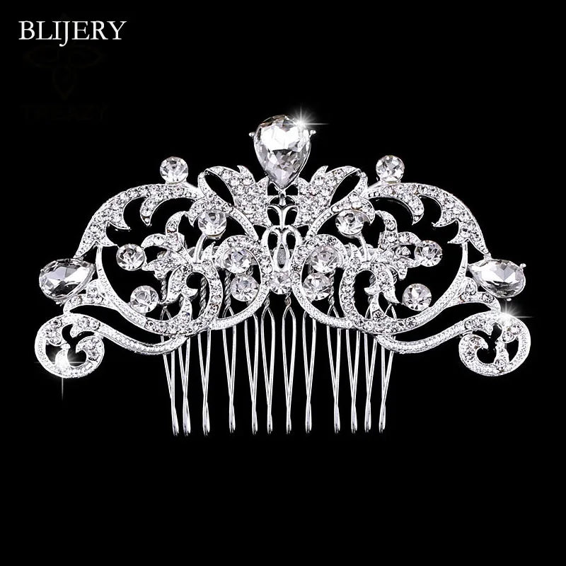 A sparkling silver rhinestone bridal hair comb tiara with intricate floral designs.