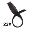 A bundle of black 23# synthetic hair extensions shown coiled in an 'X' shape.
