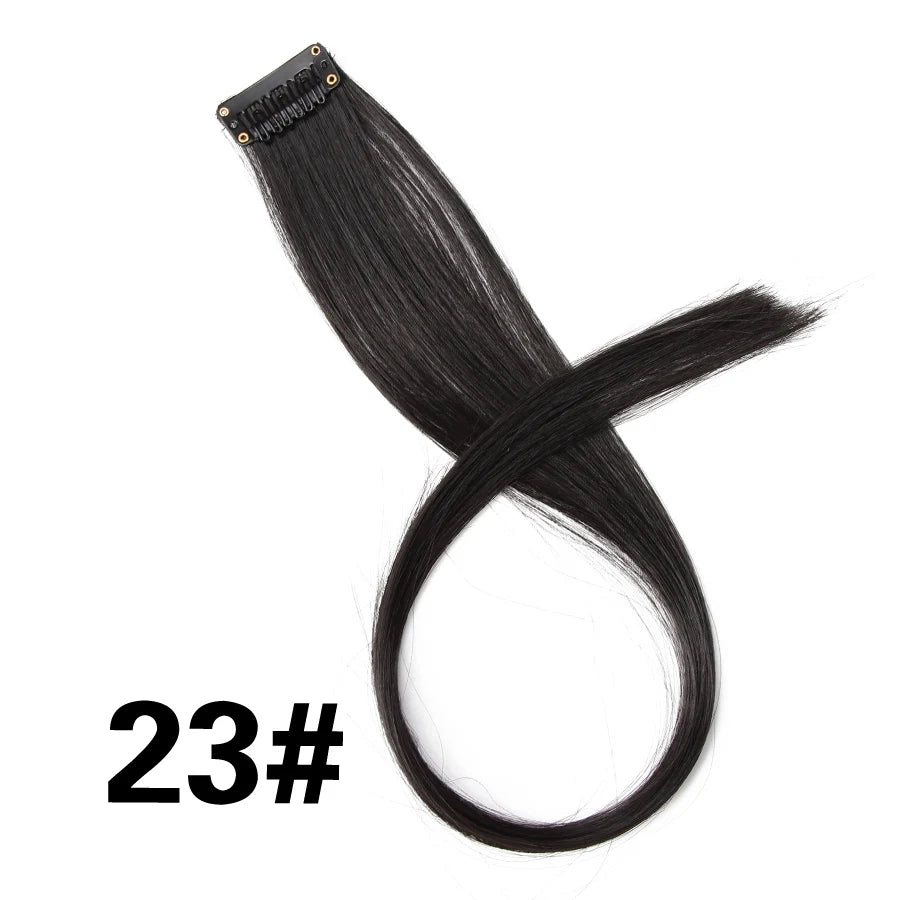 A bundle of black 23# synthetic hair extensions shown coiled in an 'X' shape.