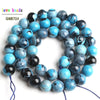 A strand of natural sky blue fire agate spacer beads for DIY jewelry, featuring various shades of blue and black.