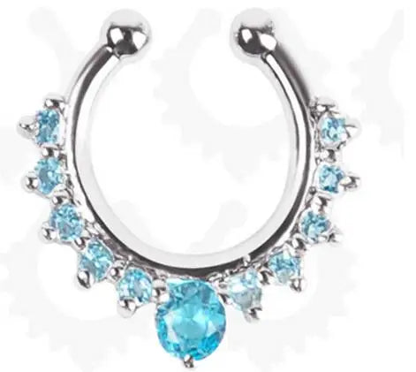 Silver hoop nose ring with blue accent stones and a central blue gemstone.