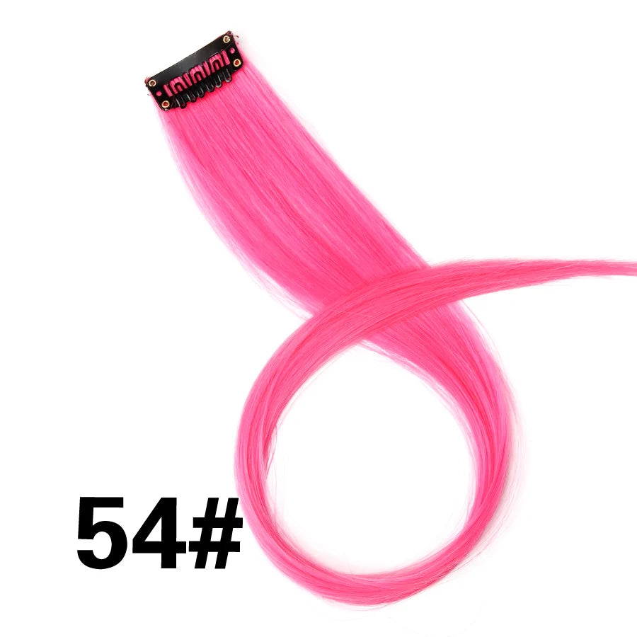 A bundle of bright pink synthetic hair extensions with a clip-in attachment.