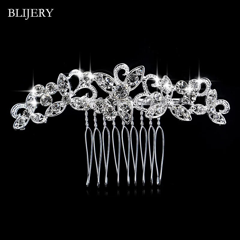 A delicate silver rhinestone bridal hair comb tiara with dangling strands.
