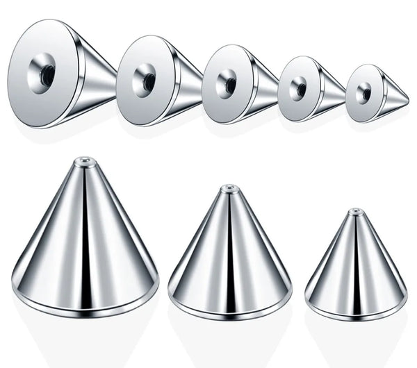 A row of polished stainless steel body piercing studs and labret rings shown in various angles.