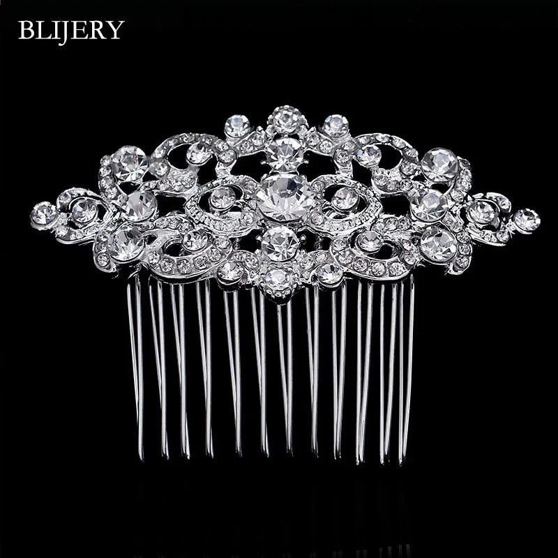 A sparkling silver rhinestone bridal hair comb tiara with long strands