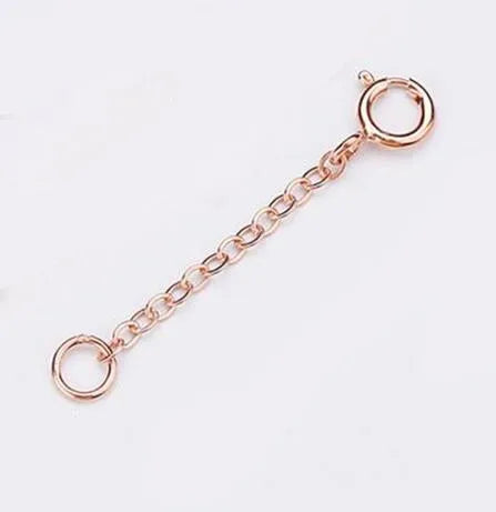 A delicate gold-toned extension chain with a loop for jewelry making.