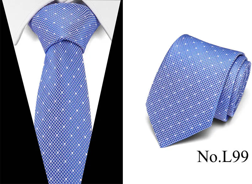 Blue silk jacquard tie folded and displayed against a white background.