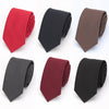A set of four slim fit wool neck ties in red, black, brown, and charcoal colors displayed on a white background.