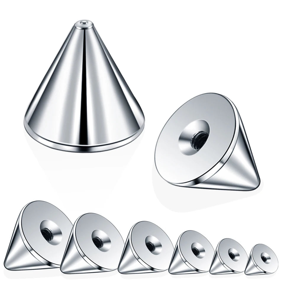 Collection de piercings et anneaux de corps en acier inoxydable, présentés sous divers angles.