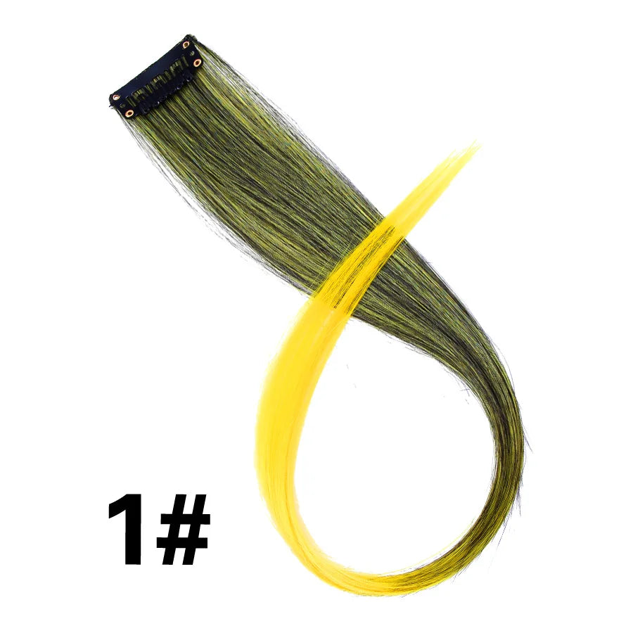 A bundle of bright yellow synthetic hair extensions is shown, with a section of green hair visible.