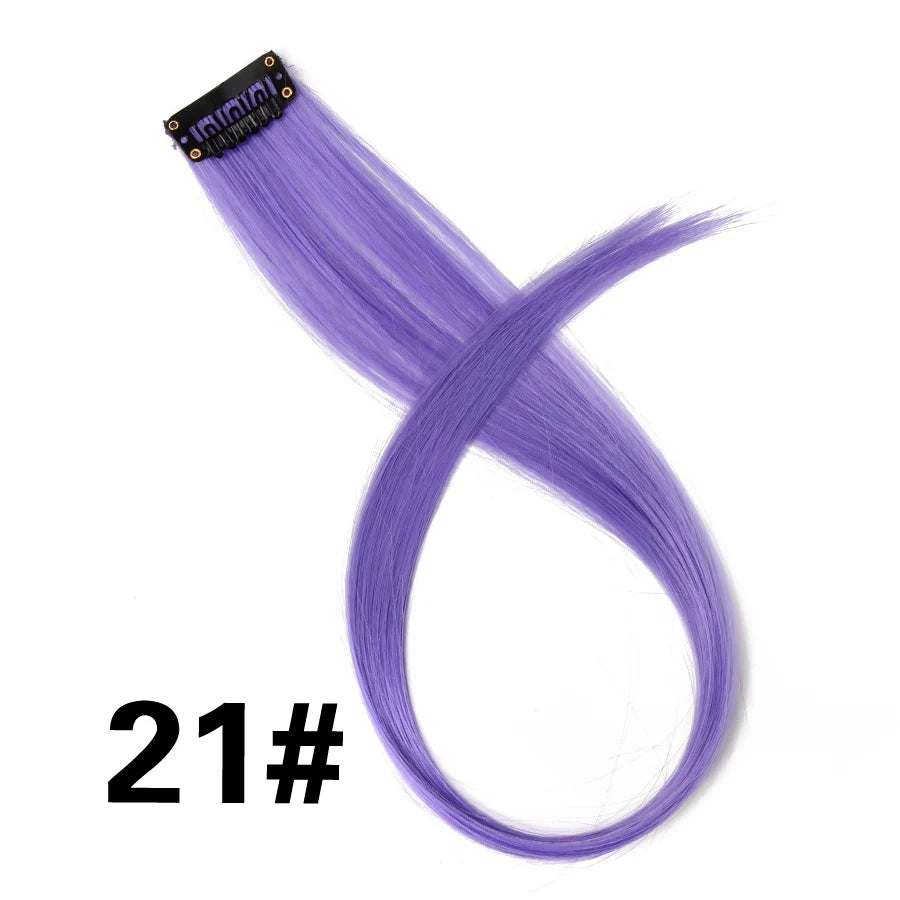A bundle of purple synthetic hair extensions with a clip-in attachment.