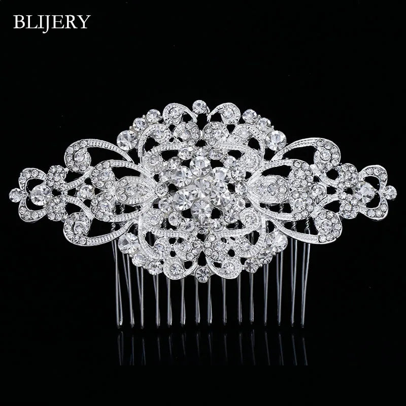 A detailed silver rhinestone bridal hair comb tiara with intricate floral design.