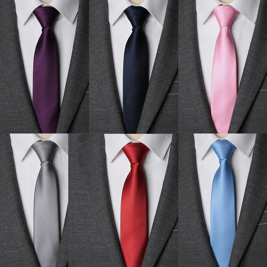 A collection of nine men's ties in various colors including purple, navy blue, pink, gray, and red, shown against a suit jack