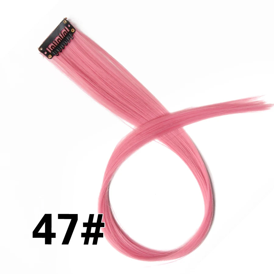 A bundle of pink synthetic hair extensions with a clip-in attachment.