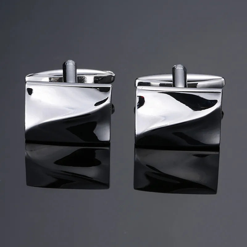 A pair of silver men's classic square cufflinks with a polished finish.