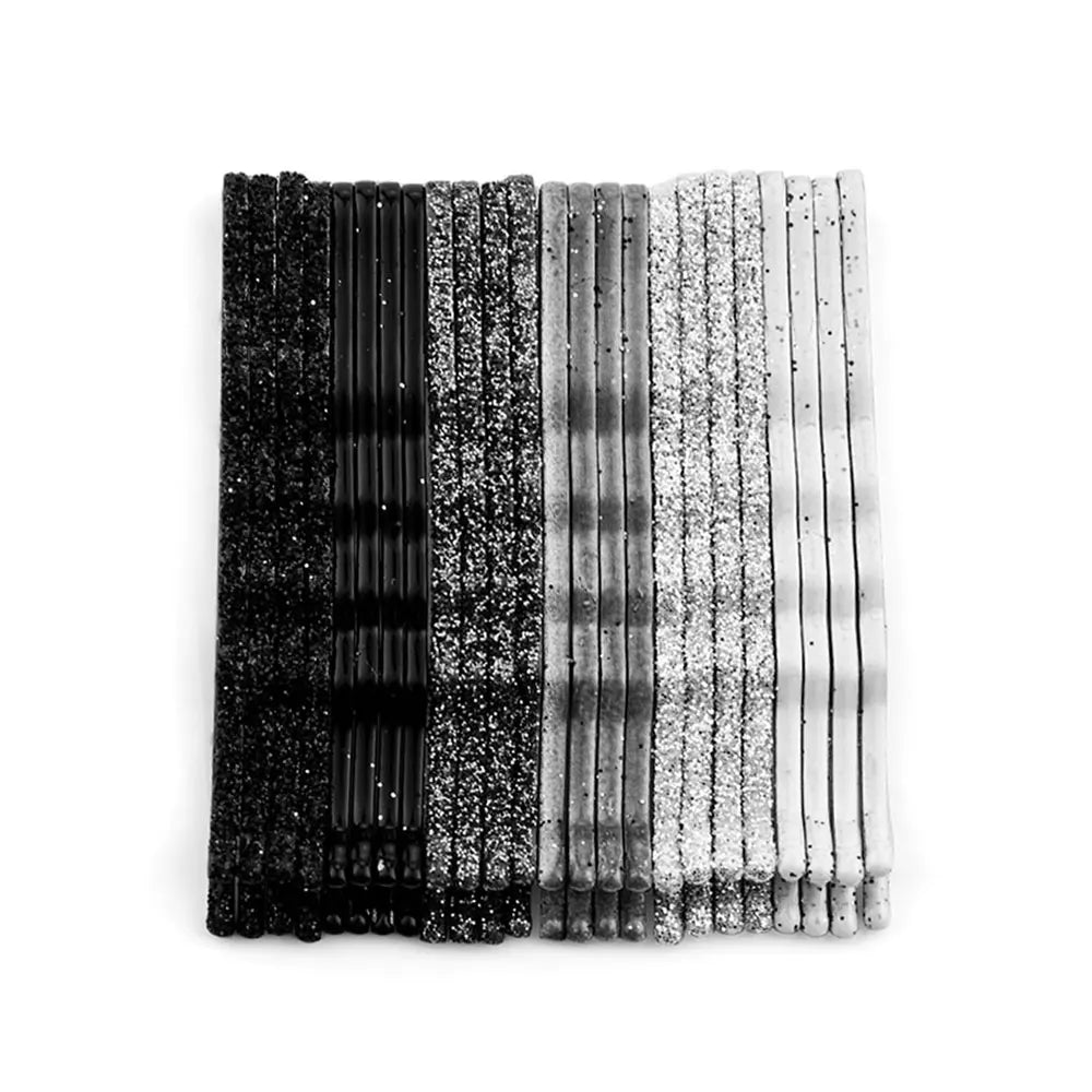A set of 24 glitter wavy hair clips and bobby pins in various shades of black, silver, and gray.