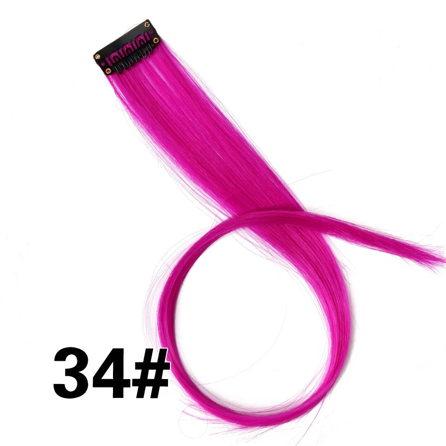 A bundle of bright pink synthetic hair extensions with a clip-in attachment.