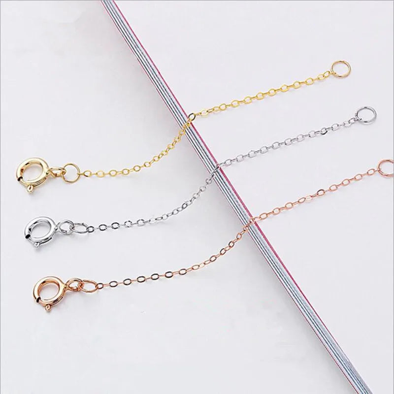 Three extension chains of 925 sterling silver jewelry chains displayed against a white background.