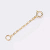 A delicate gold-toned extension chain with a loop for jewelry making.