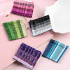 A collection of 24 glitter wavy hair clips and bobby pins in various colors including pink, green, black, and blue.