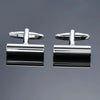 A pair of men's classic copper square cufflinks with silver-toned clasps and polished metal finishes.