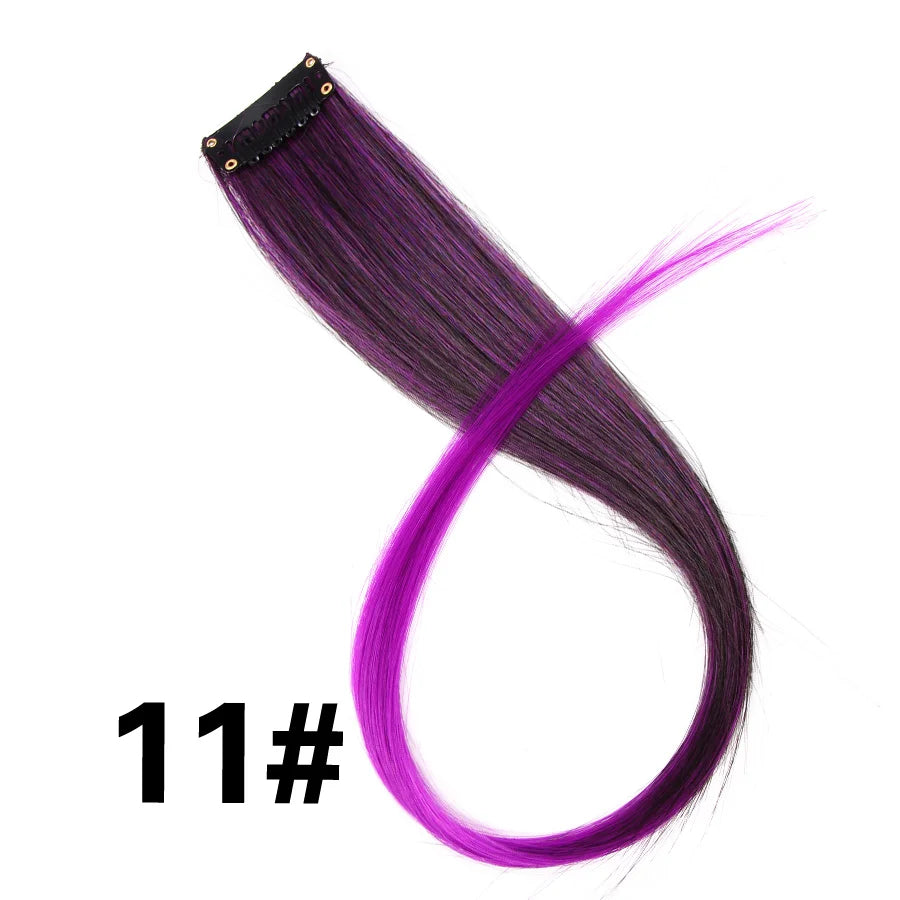 A bundle of dark purple and bright pink synthetic hair extensions with a clip-in attachment.