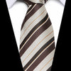 A close-up of a men's silk jacquard tie featuring diagonal stripes in brown, beige, and white.