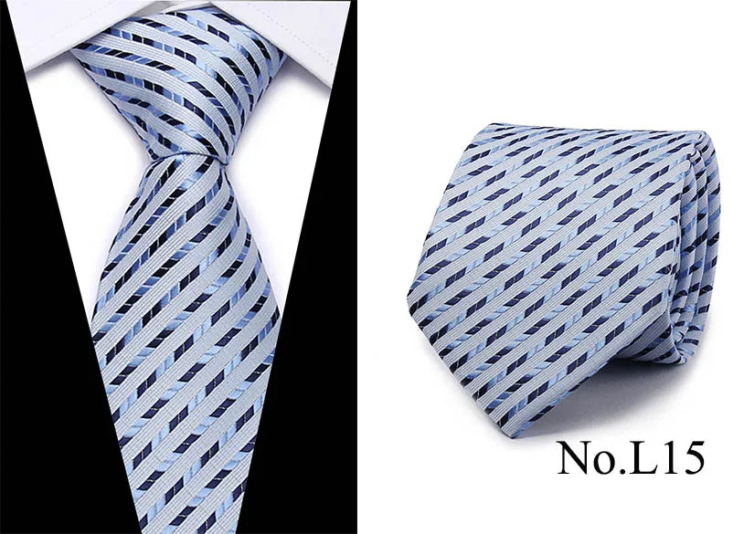 A folded blue and white patterned silk jacquard tie shown against a black background.