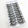 A tray of dramatic mink false eyelashes displayed on a white background.