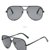 A pair of black gradient aviator sunglasses shown in a straight-on view and a 45-degree angle.