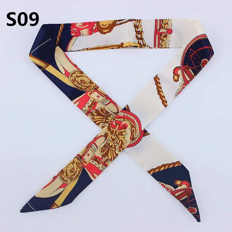 A multi-color leopard print silk headband scarf shown in an 'X' shape.