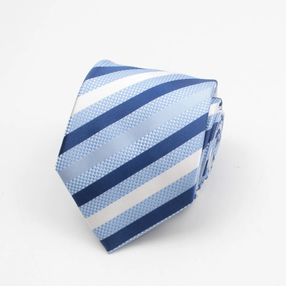 A folded blue and white striped necktie with a dotted pattern.