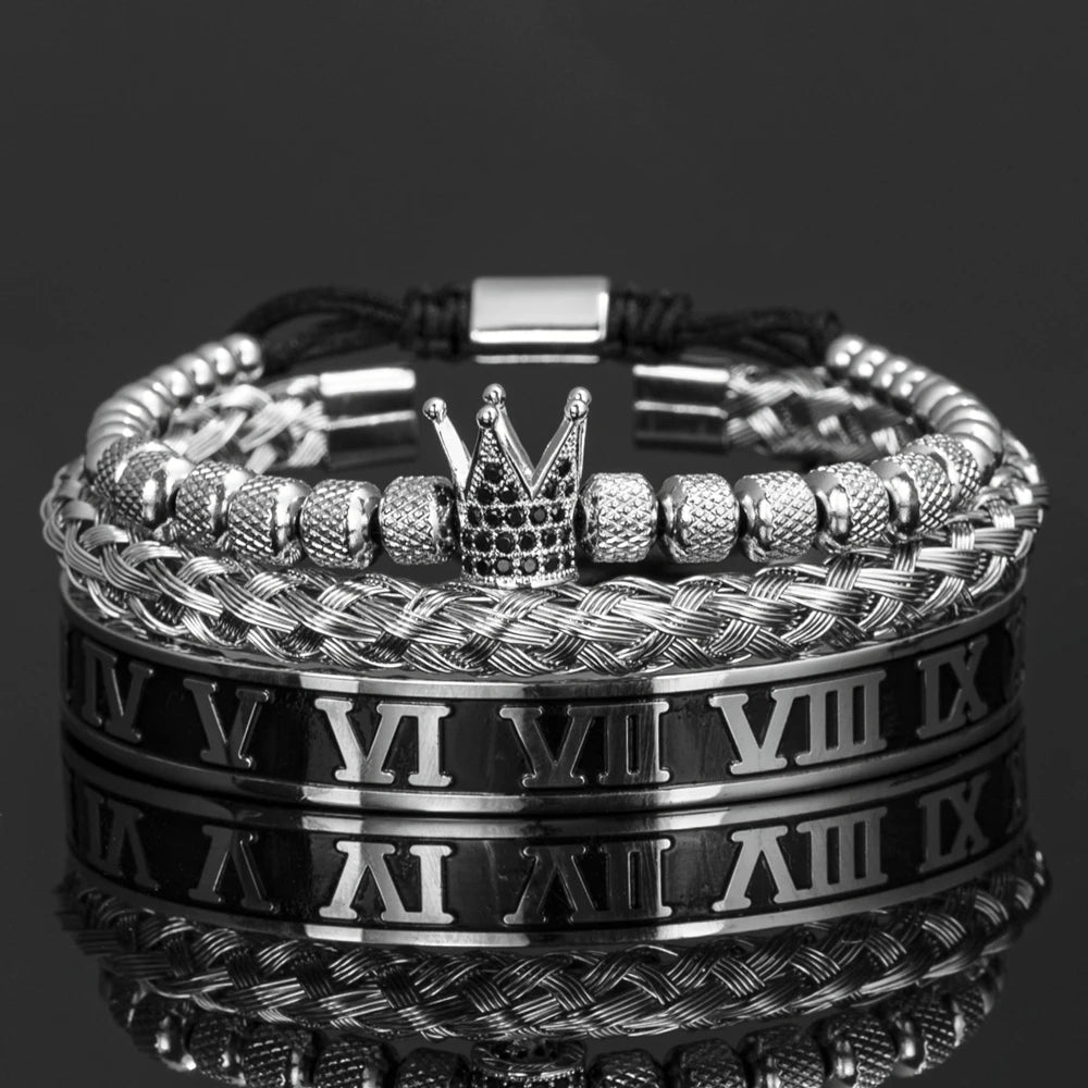 Pulseras de esmalte plateado y negro con números romanos y un diseño de corona.