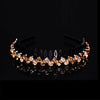 A sparkling pearl rhinestone anti-slip headband for women displayed on a dark surface.