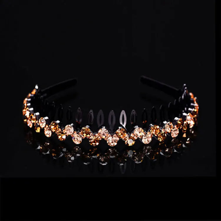 A sparkling pearl rhinestone anti-slip headband for women displayed on a dark surface.