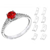 A silver ring with a large red gemstone and a set of silicone ring size adjusters.