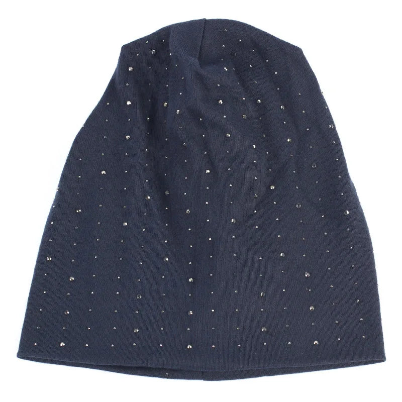 Navy blue beanie hat adorned with small silver rhinestones