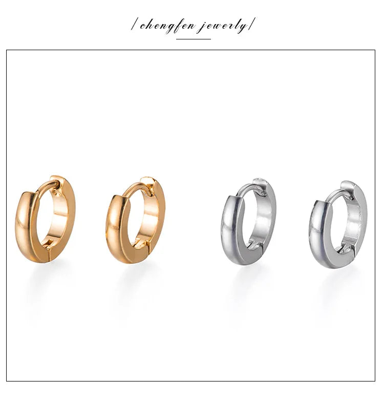A set of minimalist hoop earrings in both gold and silver finishes.