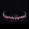A black rhinestone anti-slip hairband for women featuring pink and blue colored faux pearls.