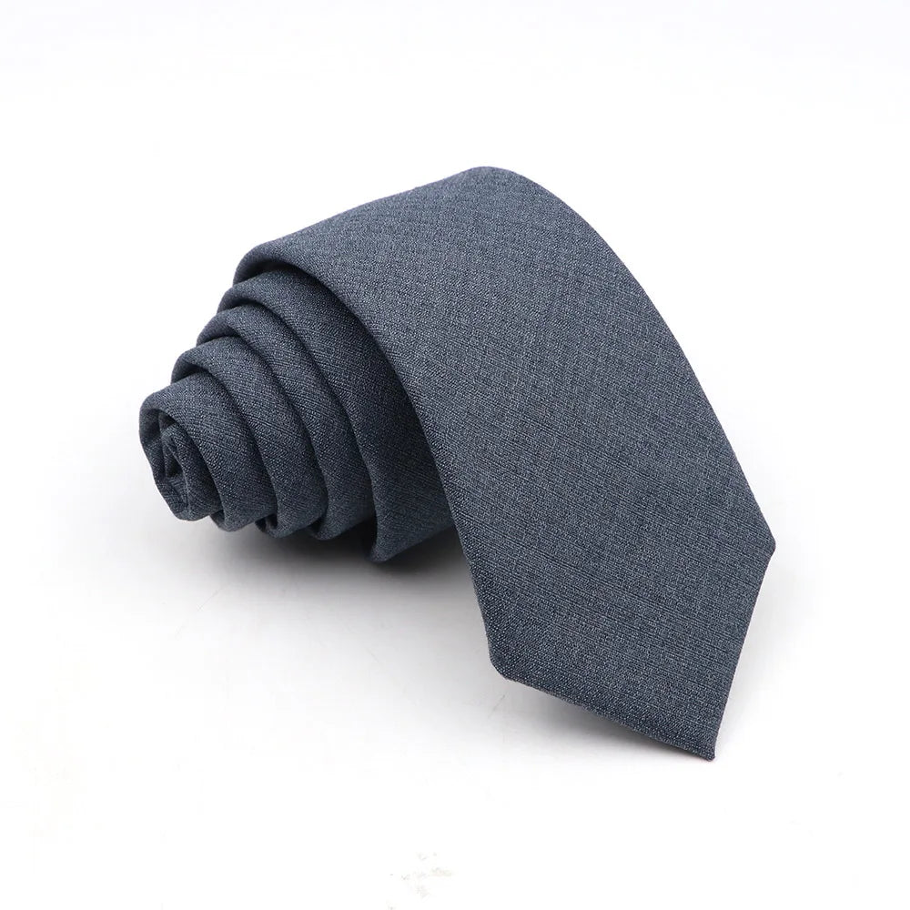 A dark gray anti-wrinkle bamboo fiber necktie folded neatly.